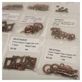 Lot of Antique copper alloy finings. 13 packages total.