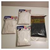 Lot of four packages craft all purpose fluffs, decorative and craft feathers.