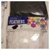 Lot of four packages craft all purpose fluffs, decorative and craft feathers.