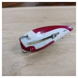 Two-piece lot of fish trap, weedless, snagless, spoon lures.