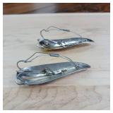 Two-piece lot of fish trap, weedless, snagless, spoon lures.