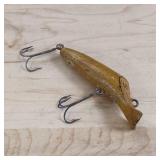 Vintage wooden fishing lure, possibly a Creek Chub Bait Company (C.C.B. Co.) or similar