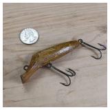 Vintage wooden fishing lure, possibly a Creek Chub Bait Company (C.C.B. Co.) or similar