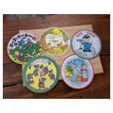 The colorful, illustrated labels feature classic nursery rhymes and simple moral lessons, such as "Shoo Fly Don