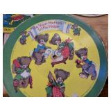 The colorful, illustrated labels feature classic nursery rhymes and simple moral lessons, such as "Shoo Fly Don