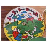 The colorful, illustrated labels feature classic nursery rhymes and simple moral lessons, such as "Shoo Fly Don
