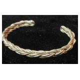 18g Sterling silver cuff bracelet. 6 strand braided design. Open cuff allows for slight adjustments to fit various sizes. Handmade with sterling silver wire, soldered smooth ends.