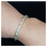 18g Sterling silver cuff bracelet. 6 strand braided design. Open cuff allows for slight adjustments to fit various sizes. Handmade with sterling silver wire, soldered smooth ends.