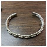 18g Sterling silver cuff bracelet. 6 strand braided design. Open cuff allows for slight adjustments to fit various sizes. Handmade with sterling silver wire, soldered smooth ends.
