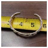 18g Sterling silver cuff bracelet. 6 strand braided design. Open cuff allows for slight adjustments to fit various sizes. Handmade with sterling silver wire, soldered smooth ends.
