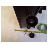 Antique Western Electric oak cased wall-mounted crank telephone, commonly used in the early 20th century