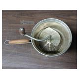 Vintage Foley food mill, commonly used for mashing and straining foods like applesauce or tomatoes