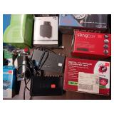 Large Lot  collection of electronic networking and media hardware, including several Slingbox devices, a digital-to-analog converter box, and various routers/modems