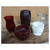 These vintage apothecary jars originally used in pharmacies to store and display medicines and chemicals