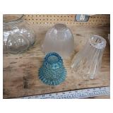 These vintage apothecary jars originally used in pharmacies to store and display medicines and chemicals