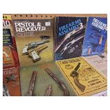 Collection of vintage firearms magazines and catalogs from the mid-20th century.