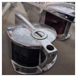 Lot of boat parts, primarily chrome accessories including spotlights, navigation lights, and a horn