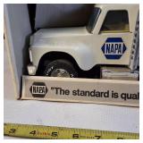 Vintage Nylint NAPA Auto Parts Pressed Steel Semi-Truck and Trailer toy, often found in a white box with "The standard is quality" branding.