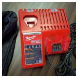 Milwaukee M18 & M12 Multi-Voltage Charger (Model 48-59-1812).  and other chargers plus a trail cam!
