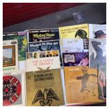 Large lot of vintage vinyl records featuring various artists and genres from the mid-20th century