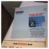 Large lot of vintage vinyl records featuring various artists and genres from the mid-20th century