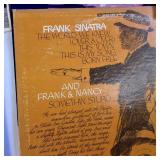 Large lot of vintage vinyl records featuring various artists and genres from the mid-20th century