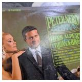 Large lot of vintage vinyl records featuring various artists and genres from the mid-20th century