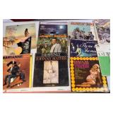 A collection of vintage vinyl records from various artists and genres.