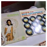 A collection of vintage vinyl records from various artists and genres.