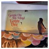 A collection of vintage vinyl records from various artists and genres.