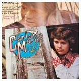 A  large collection of vintage vinyl records from artists like Johnny Mathis, Billy Vaughn, Ray Conniff, and Dean Martin