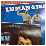 A  large collection of vintage vinyl records from artists like Johnny Mathis, Billy Vaughn, Ray Conniff, and Dean Martin