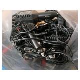 Large collection of various electronic cables, connectors, and a boxed electronic devices