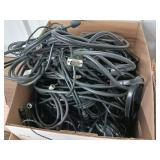 Large collection of various electronic cables, connectors, and a boxed electronic devices