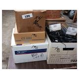 Large collection of various electronic cables, connectors, and a boxed electronic devices