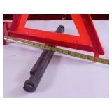 Emergency warning triangle kit used to alert other drivers to a roadside hazard or disabled vehicle.