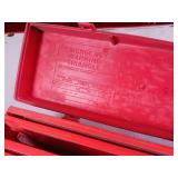 Emergency warning triangle kit used to alert other drivers to a roadside hazard or disabled vehicle.