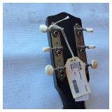 Vintage 1960s Harmony Stratotone electric guitar - highly collectible instrument.