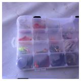 Fishing tackle bag set Okeechobee Fats soft-sided tackle bag paired with clear plastic utility trays chock full of various fishing lures.