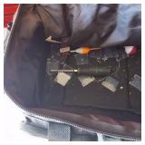 Fishing tackle bag set Okeechobee Fats soft-sided tackle bag paired with clear plastic utility trays chock full of various fishing lures.