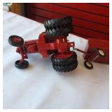 Vintage Ertl 1/16 scale International Harvester 1586 farm tractor toy plus two vintage tin hay wagons