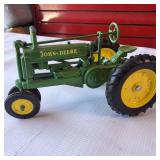 Collection of vintage John Deere harvesting equipment models, 1:64 scale set
