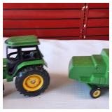 Collection of vintage John Deere harvesting equipment models, 1:64 scale set