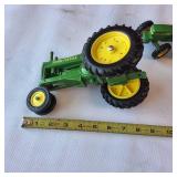 Collection of vintage John Deere harvesting equipment models, 1:64 scale set