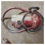 Hand-held electric concrete vibrator used to remove air bubbles and solidify concrete mixtures