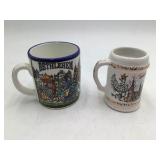 Pair of collectible souvenir mugs
