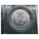 1999 Uncirculated American Silver Eagle in sealed Littleton holder