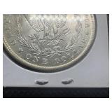 1884-O Morgan Silver Dollar Marked MS63