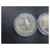 Two Commemorative Silver Dollars: 1986-S Proof Statue of Liberty and 1987-S Uncirculated "We The People"