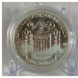 1992 D-Olympic Baseball Commemorative Uncirculated Silver Dollar - just the coin in a protective plastic case, one appears to have slight fire damage